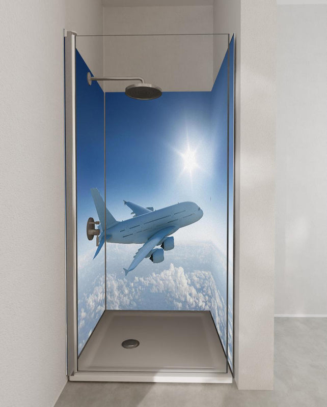 Duschrückwand - Flugzeug über weißen Wolken