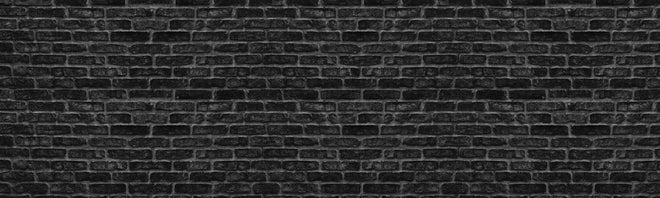 Küchenrückwand - Schwarze schlichte Ziegelwand