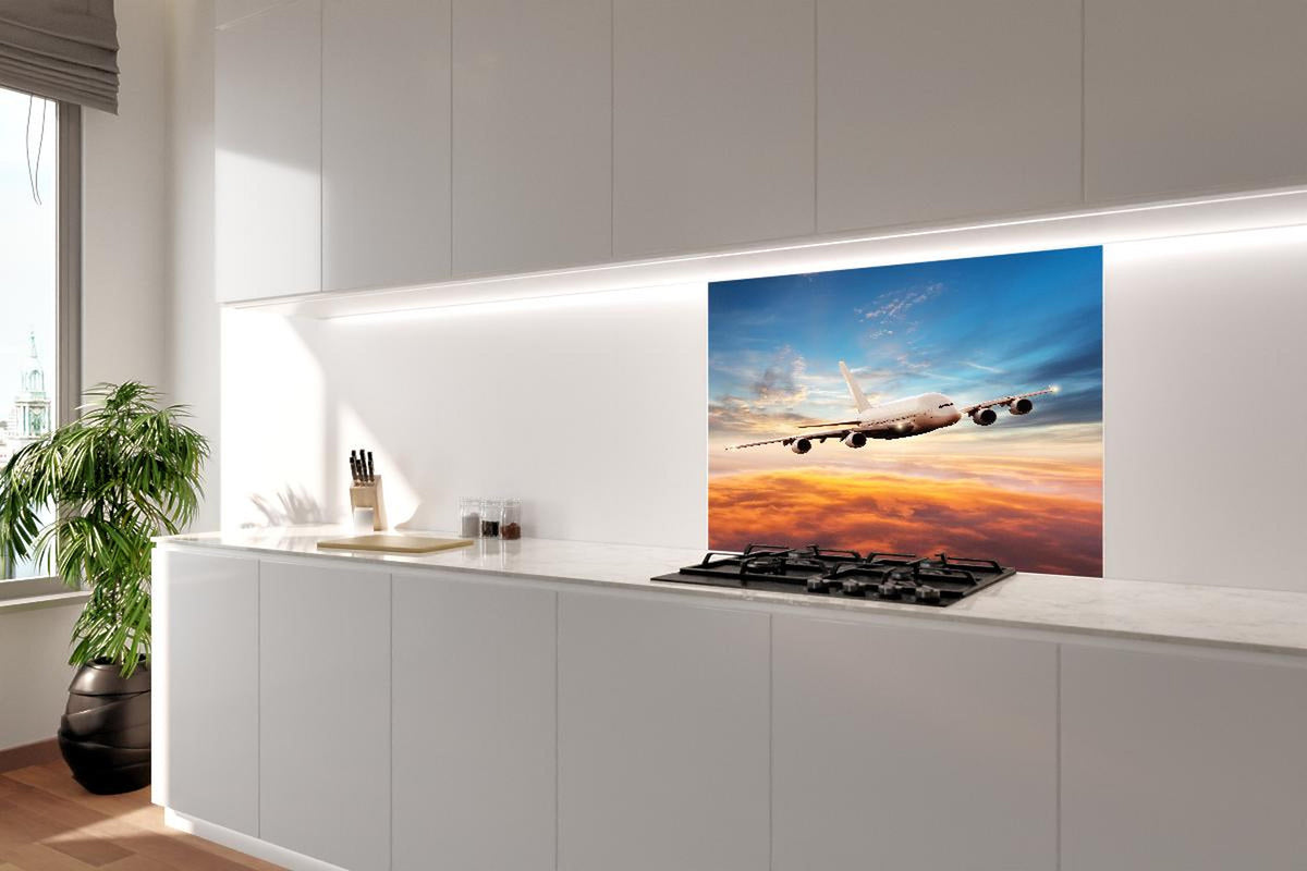 Spritzschutz - Jet im Sonnenuntergang über Wolken