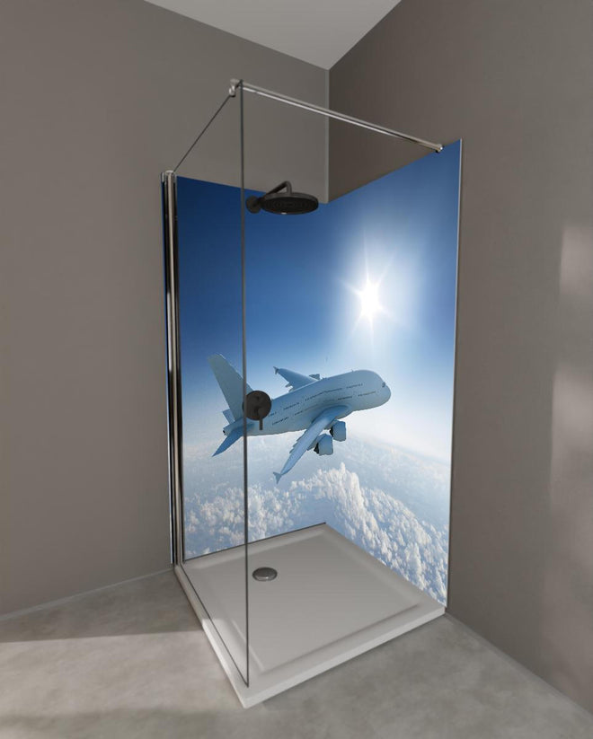 Duschrückwand - Flugzeug über weißen Wolken