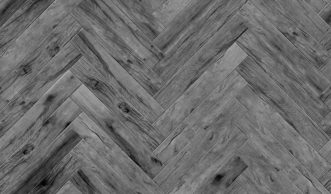 Duschrückwand - Gräuliches Holzparkett mit Fischgrätenmuster