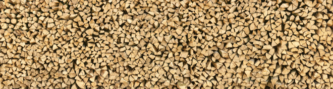 Küchenrückwand - Großer Haufen Holzscheite
