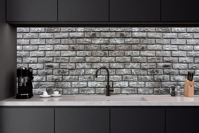 Küchenrückwand - Ziegelmauer aus dekorativem grauem Stein