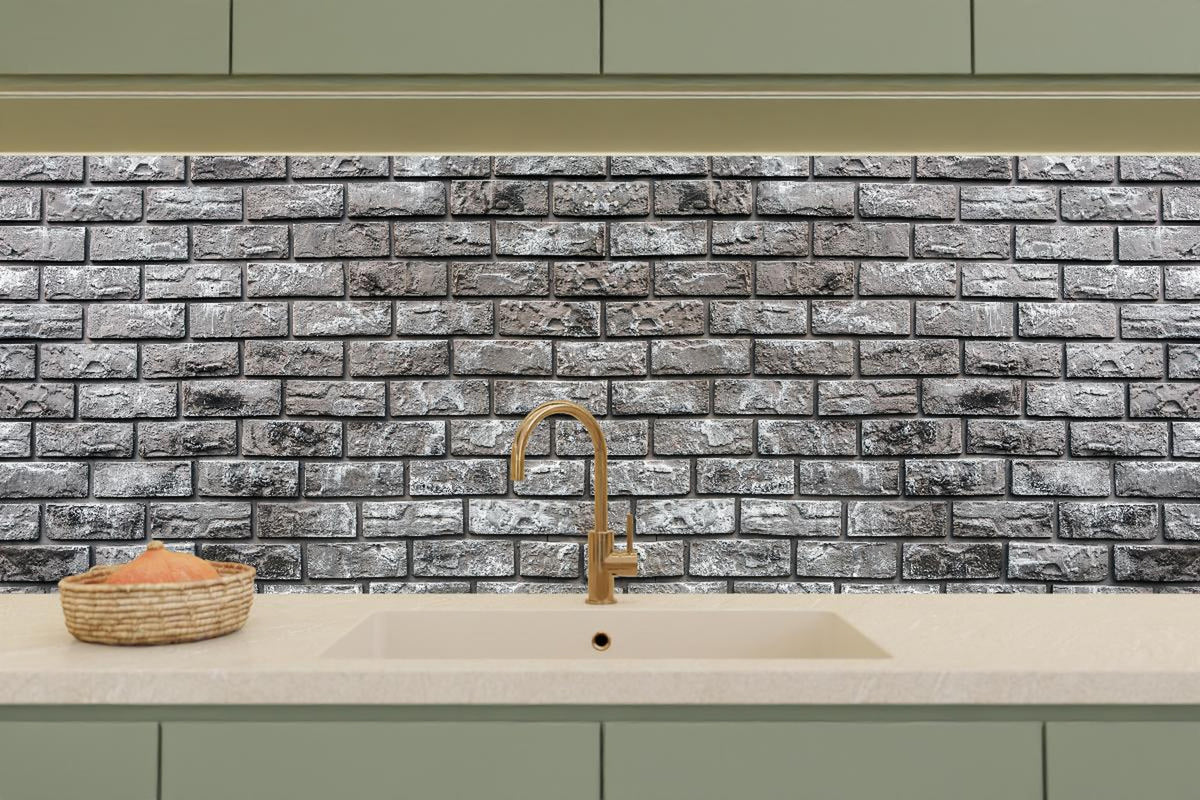 Küchenrückwand - Ziegelmauer aus dekorativem grauem Stein