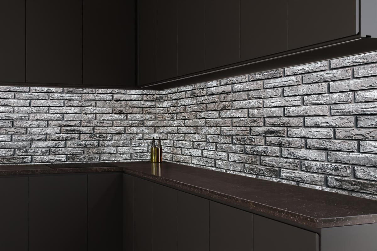 Küchenrückwand - Ziegelmauer aus dekorativem grauem Stein