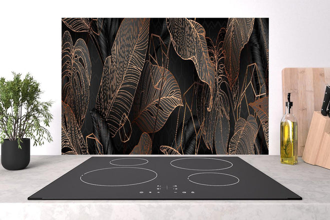 Spritzschutz - Elegante bronzene Blattlinien auf Schwarz