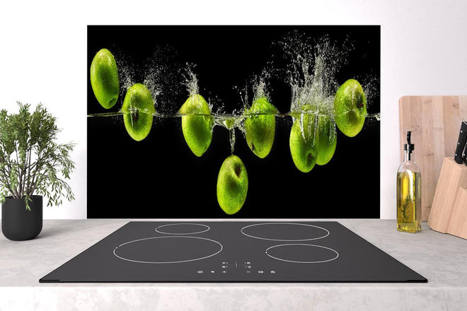 Spritzschutz - Grüne Äpfel im Wasser