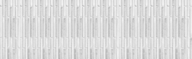 Spritzschutz - Panorama der weißen Steinwand mit Streifen Textur